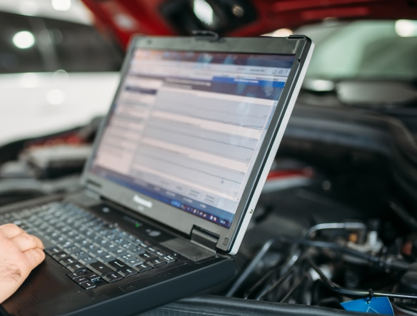 mechanic working on a laptop